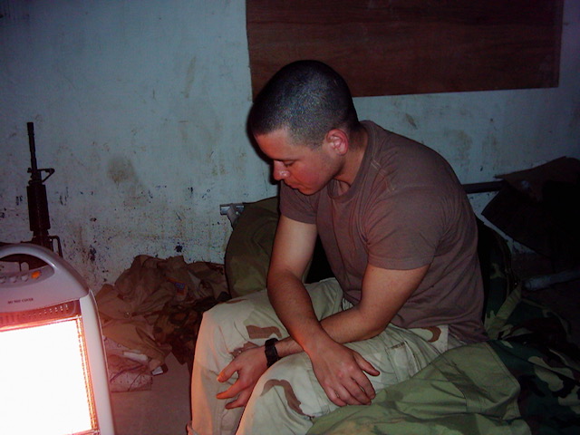Jeffrey in his room in Iraq in January 2004. 